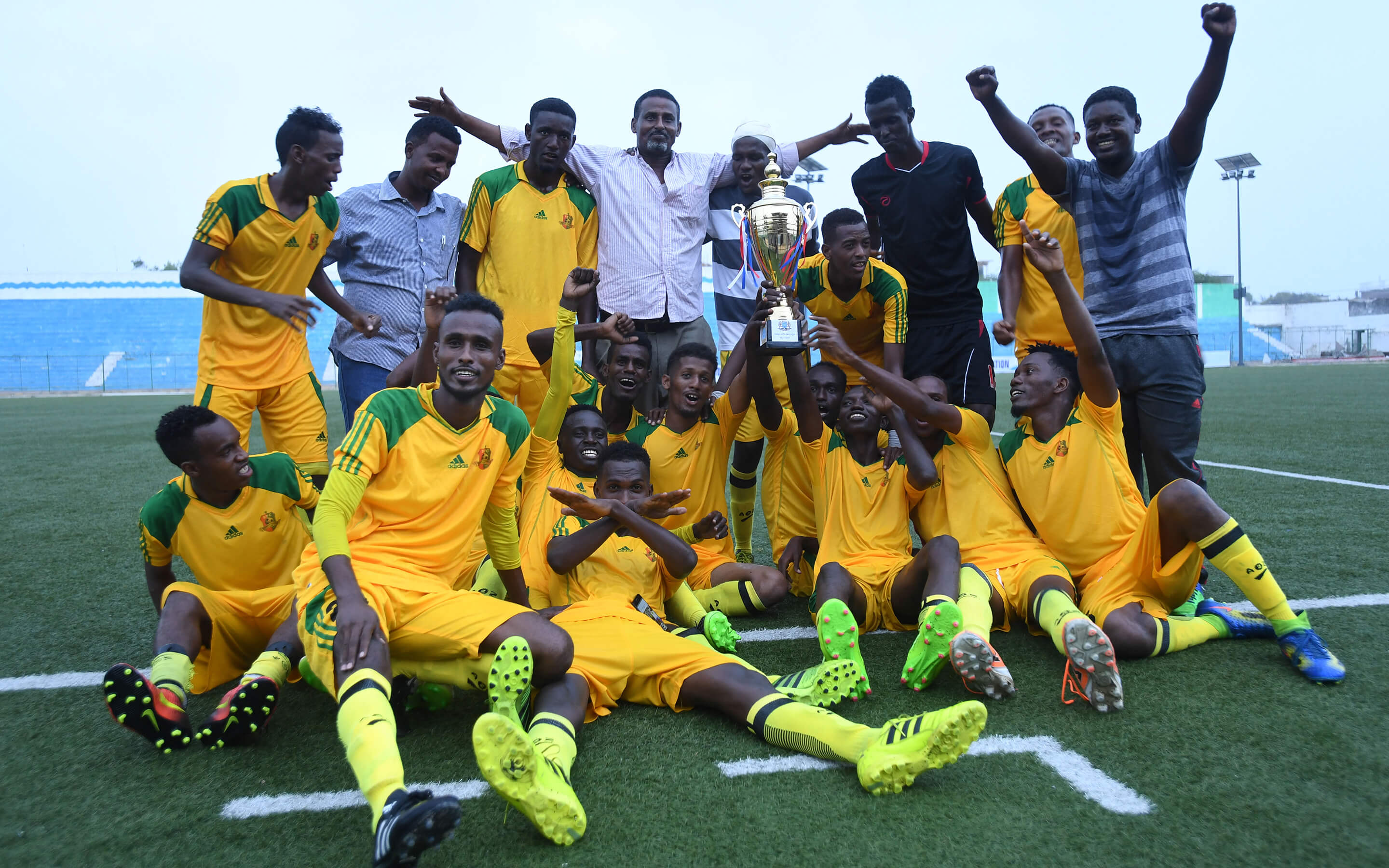 Players from Banadir Football Club celebrate their victory over Gaadiidka.